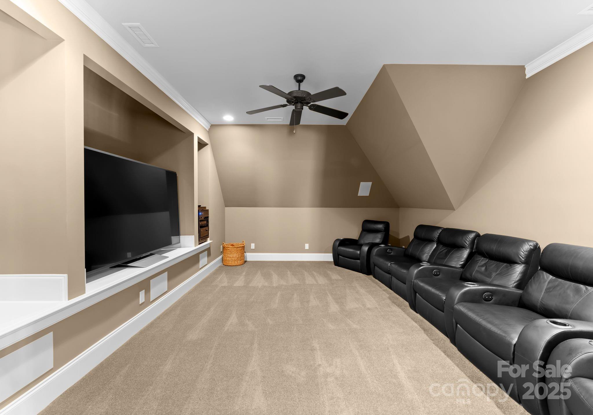4004 Channel Point Lane Denver, NC 28037 - Photo 20 of 48 a living room with furniture and a flat screen tv