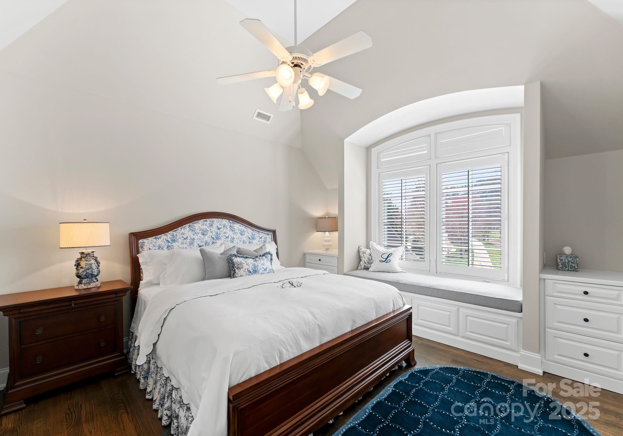 4004 Channel Point Lane Denver, NC 28037 - Photo 23 of 48 a bedroom with a large bed and a window