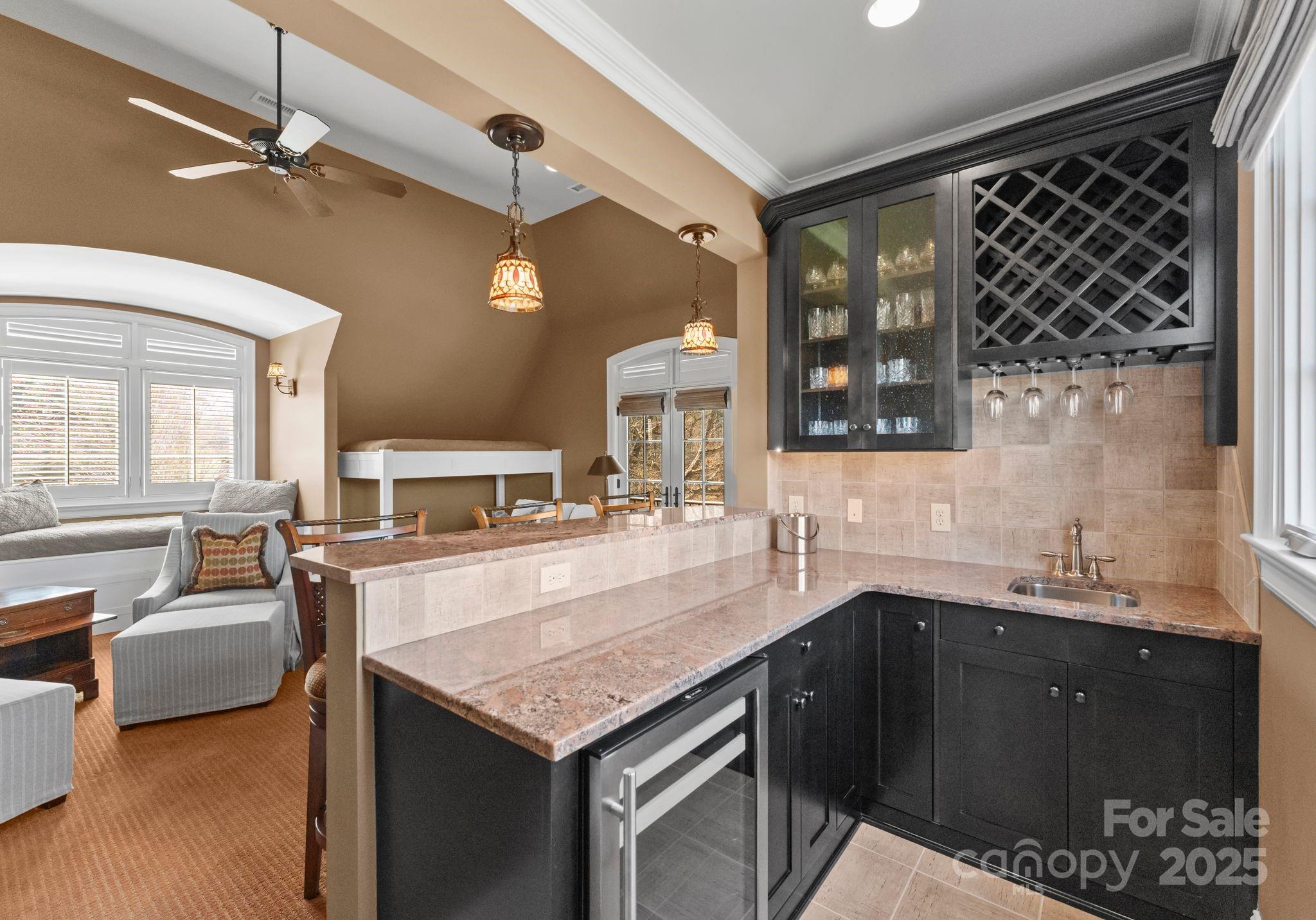 4004 Channel Point Lane Denver, NC 28037 - Photo 25 of 48 a kitchen with a sink appliances and a counter top space