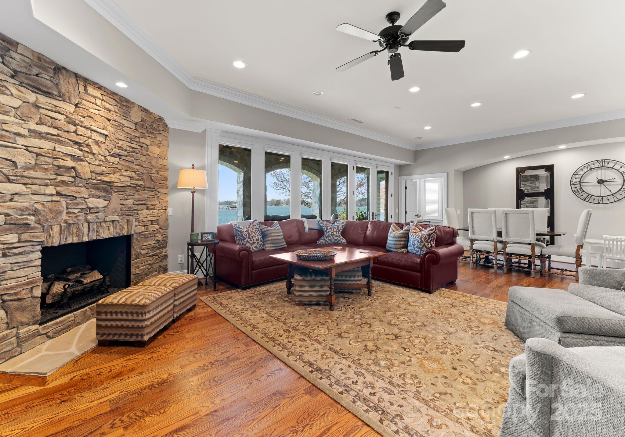 4004 Channel Point Lane Denver, NC 28037 - Photo 27 of 48 a living room with furniture and a fireplace