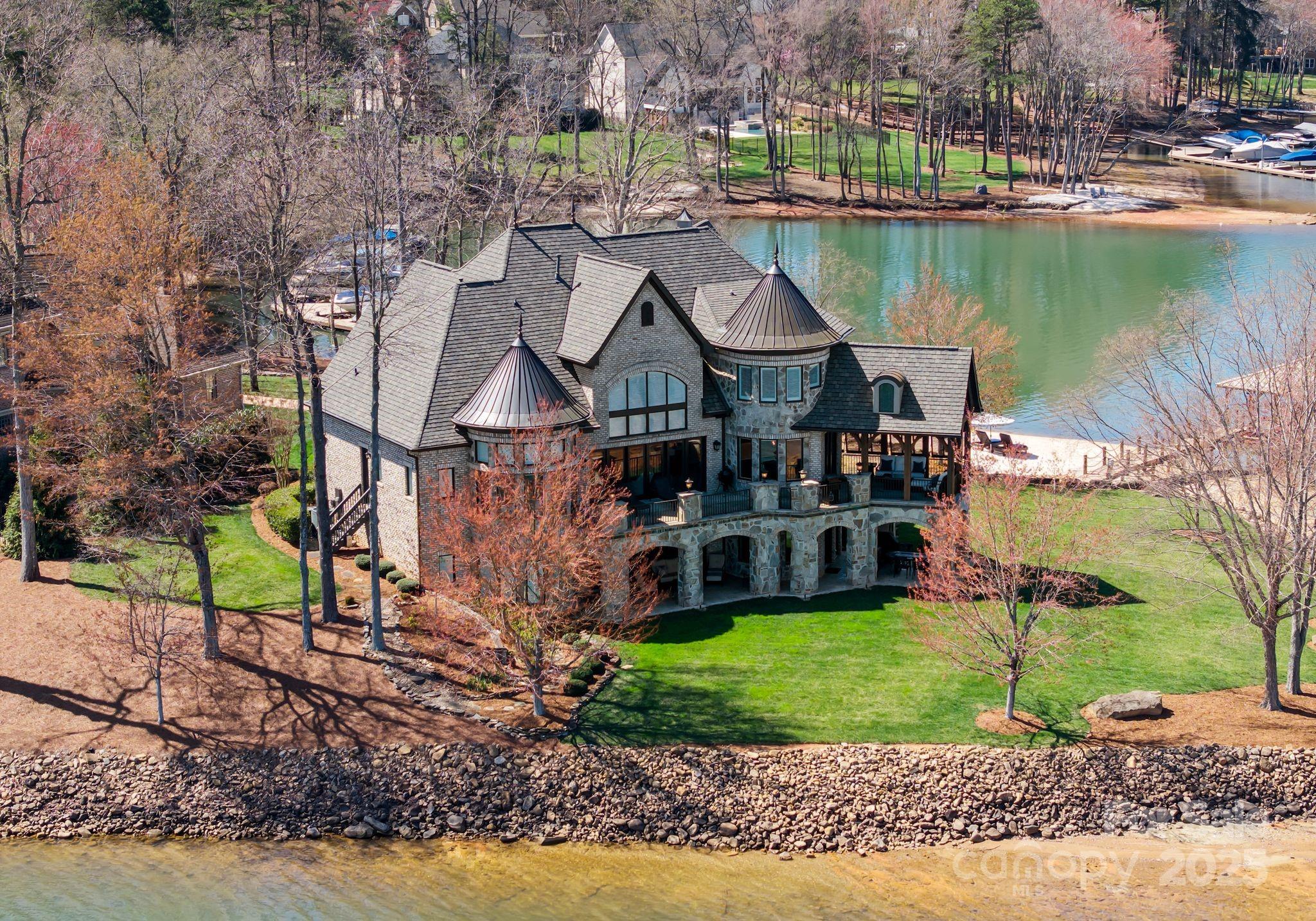 4004 Channel Point Lane Denver, NC 28037 - Photo 39 of 48 a aerial view of a house with a lake view