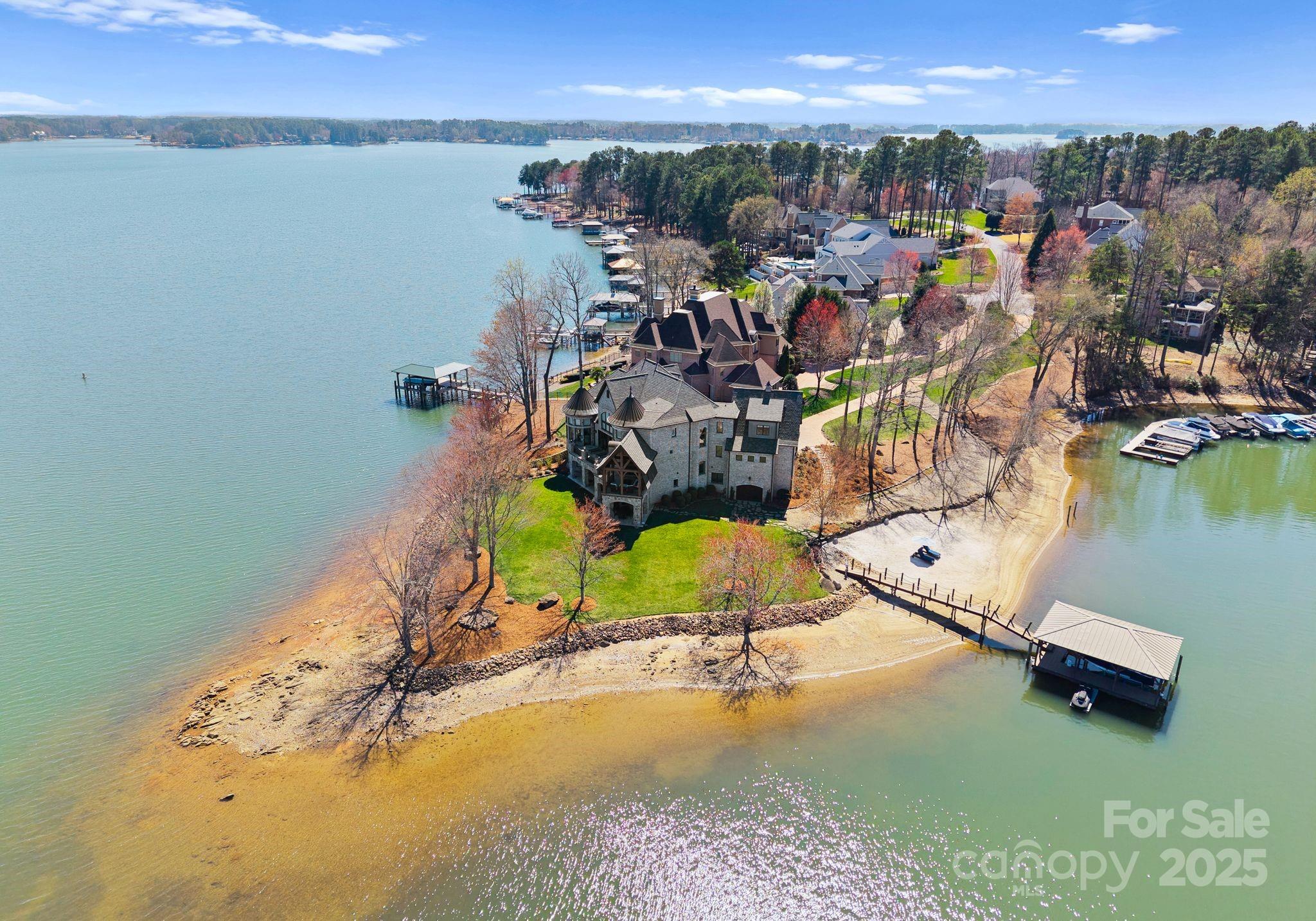 4004 Channel Point Lane Denver, NC 28037 - Photo 40 of 48 an aerial view of a house with a swimming pool and outdoor seating