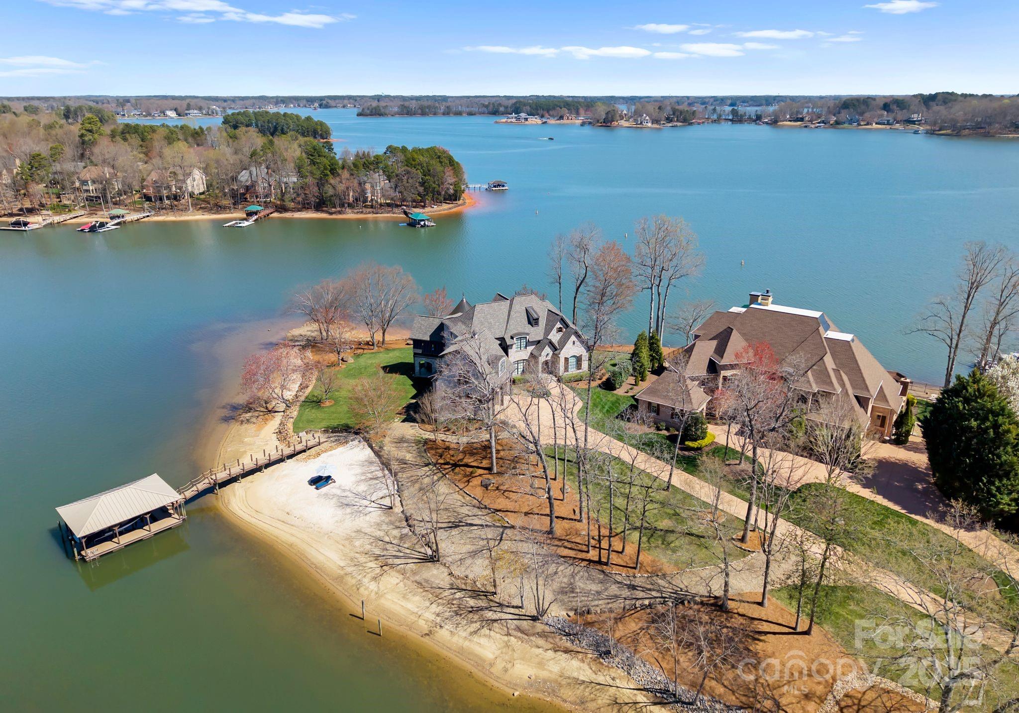 4004 Channel Point Lane Denver, NC 28037 - Photo 41 of 48 an aerial view of a house with outdoor space and lake view
