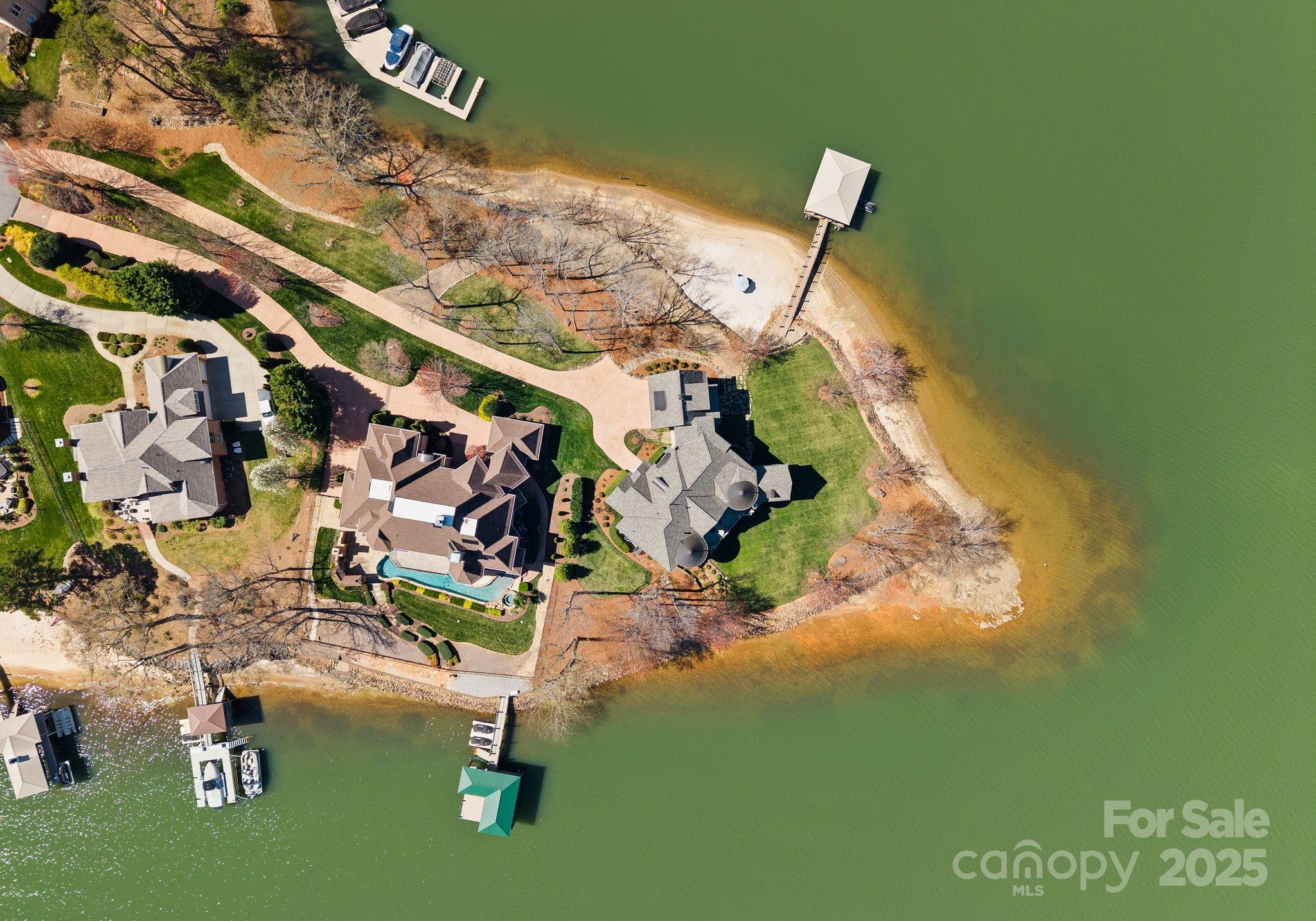 4004 Channel Point Lane Denver, NC 28037 - Photo 43 of 48 an aerial view of a house with a yard and lake view