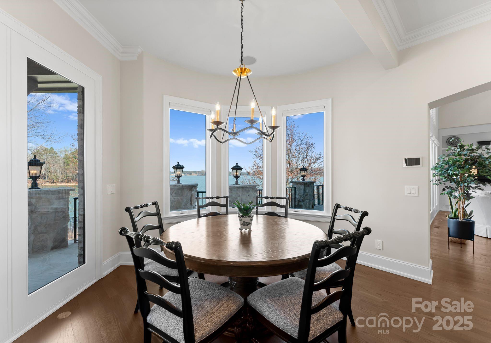 4004 Channel Point Lane Denver, NC 28037 - Photo 8 of 48 a dining room with furniture and window