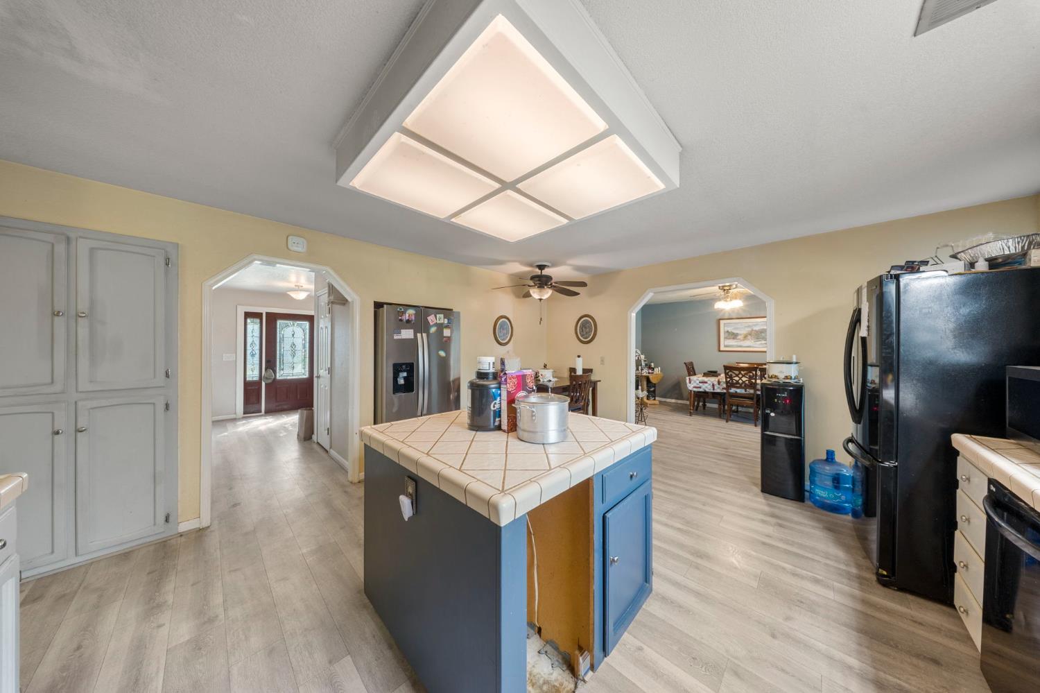2779 Story Avenue Merced, CA 95340 - Photo 8 of 27 a kitchen with sink and refrigerator