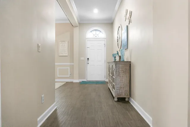 a living room with furniture and a gate