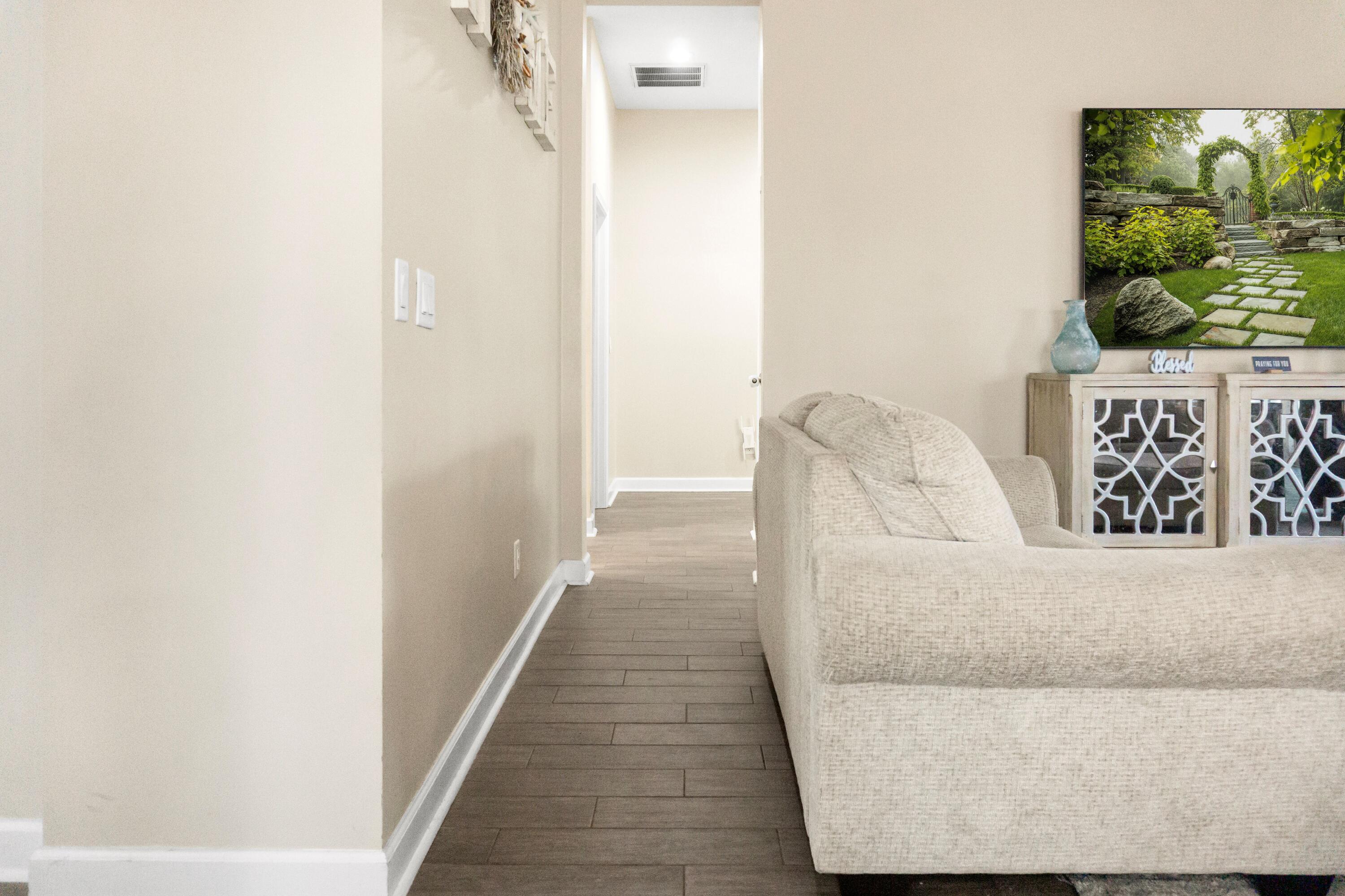 2902 Short Tail Court Panama City, FL 32405 - Photo 20 of 46 a living room with furniture and a gate