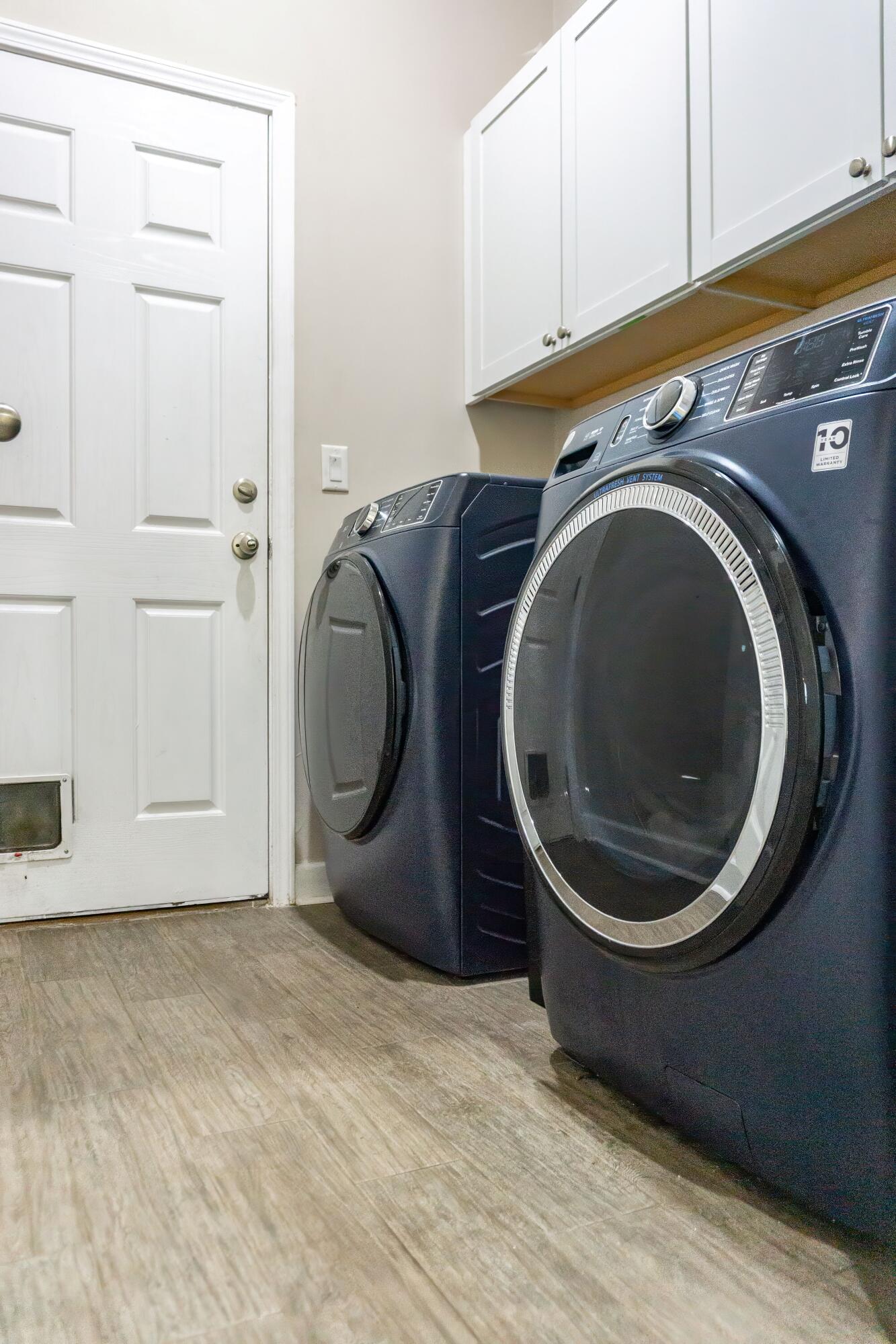 2902 Short Tail Court Panama City, FL 32405 - Photo 24 of 46 a view of a storage & utility room with washer and dryer