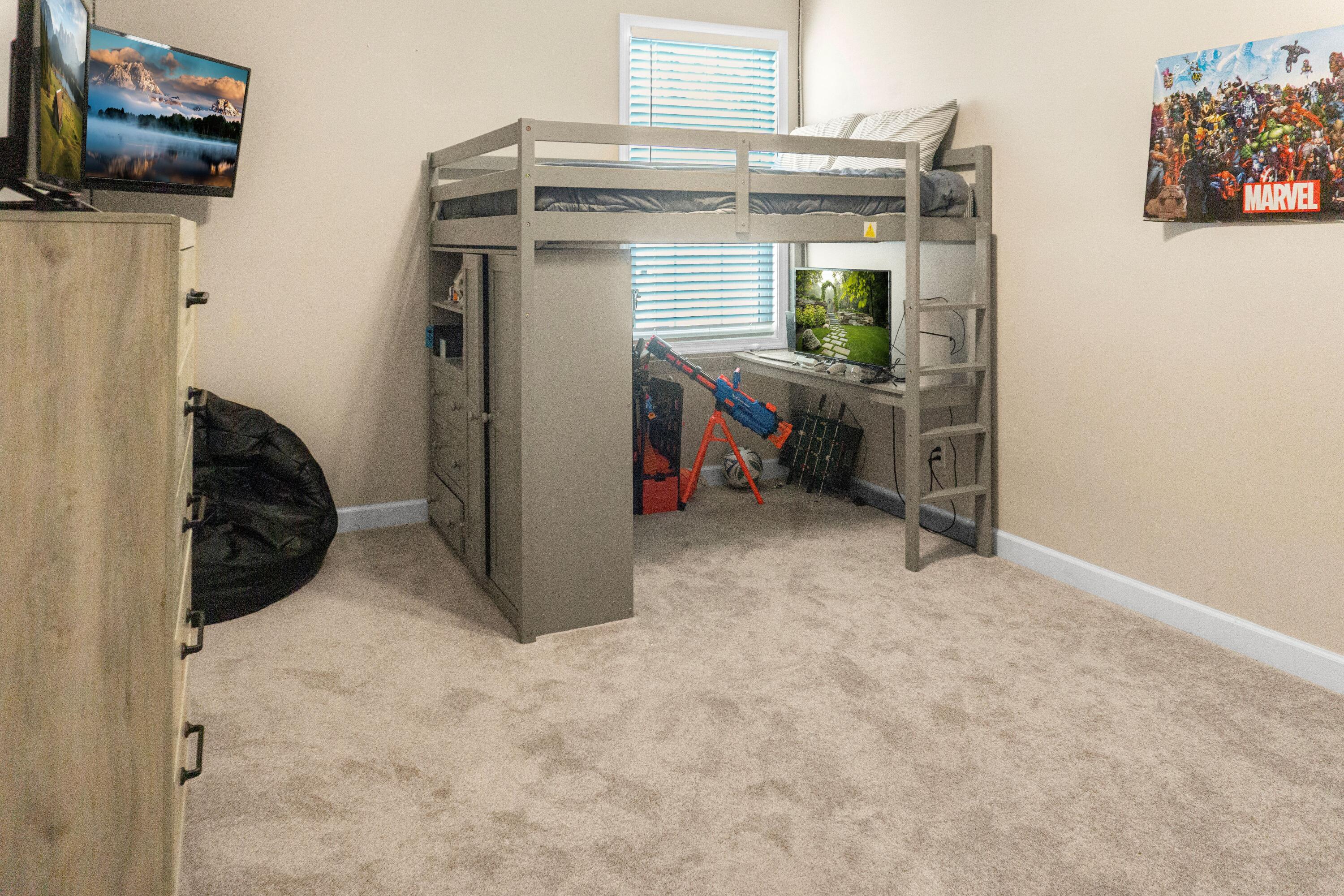 2902 Short Tail Court Panama City, FL 32405 - Photo 34 of 46 a view of livingroom with furniture and a flat screen tv
