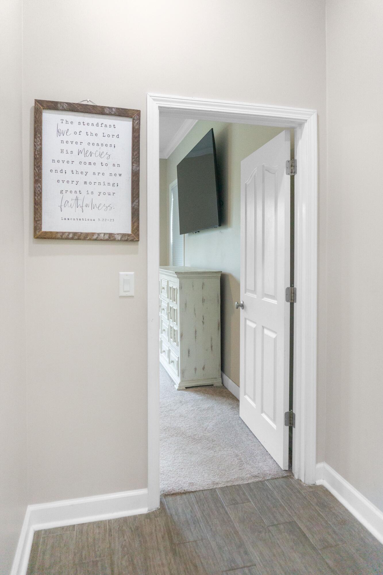 2902 Short Tail Court Panama City, FL 32405 - Photo 41 of 46 an entryway with a door and wooden floor