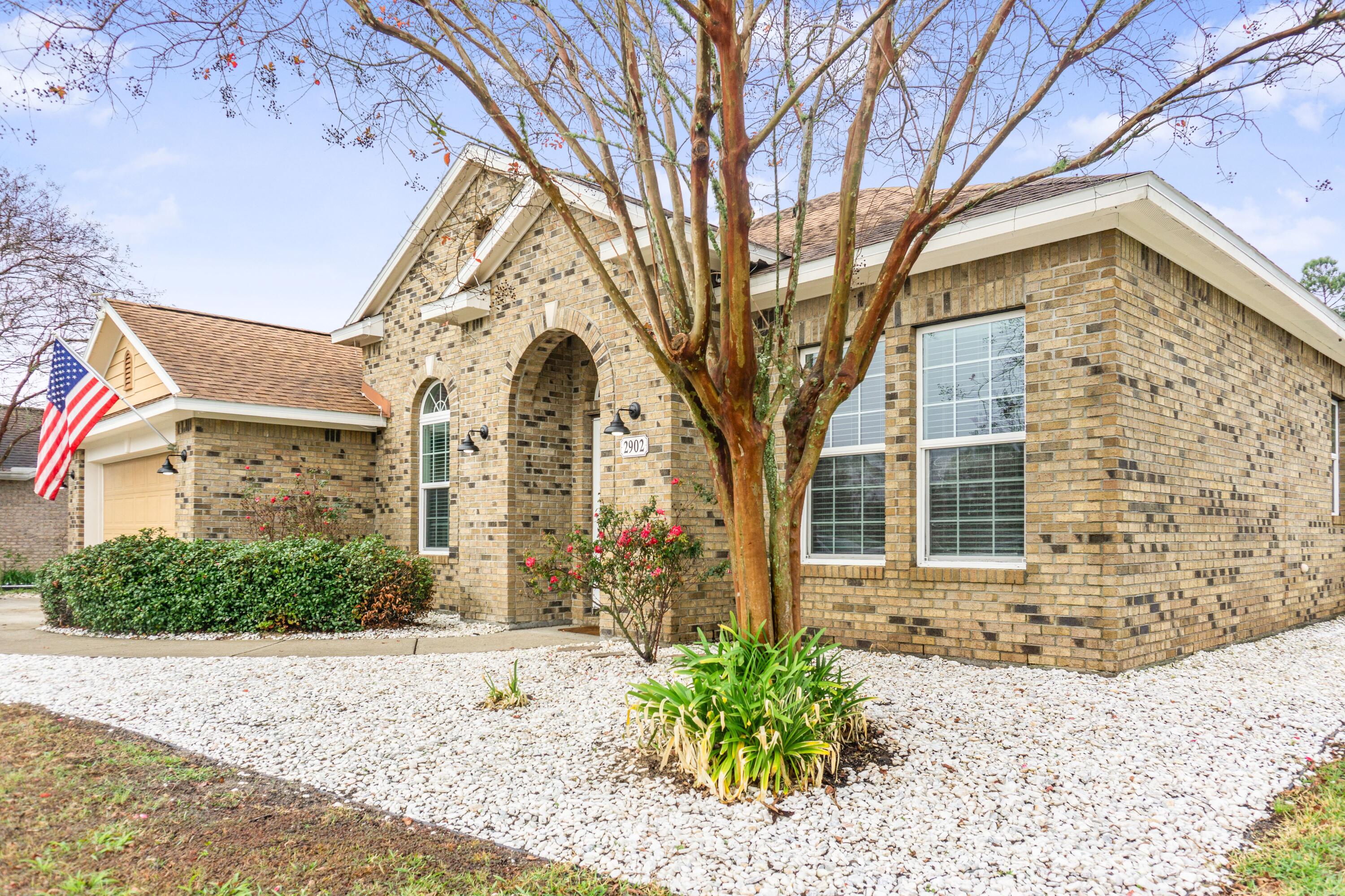 2902 Short Tail Court Panama City, FL 32405 - Photo 45 of 46 a front view of a house with a yard
