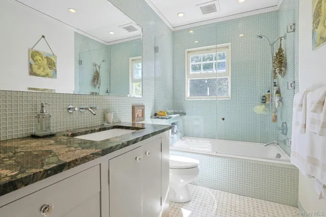 a bedroom with a bed and a table