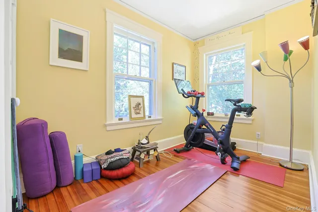 a view of a two chairs in the balcony