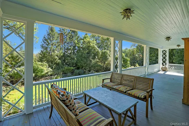 a living room with large windows