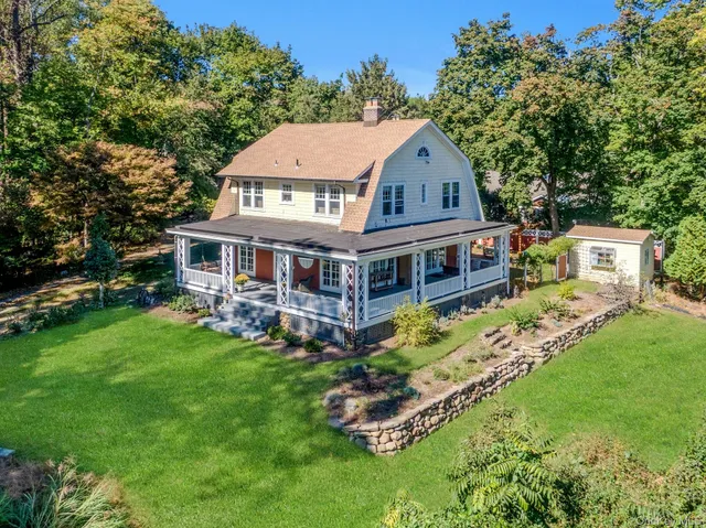 an aerial view of a house with a garden