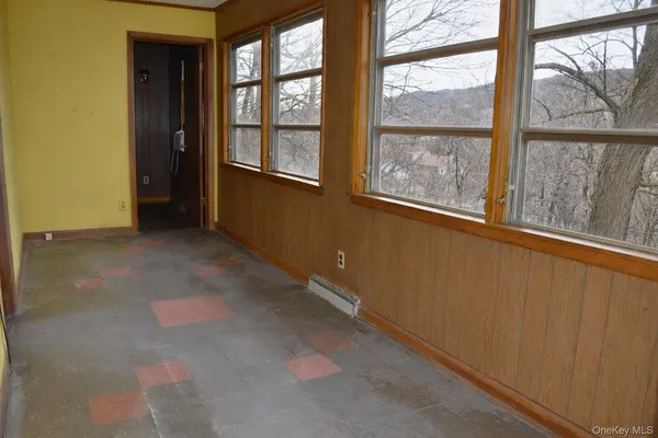 an empty room with windows