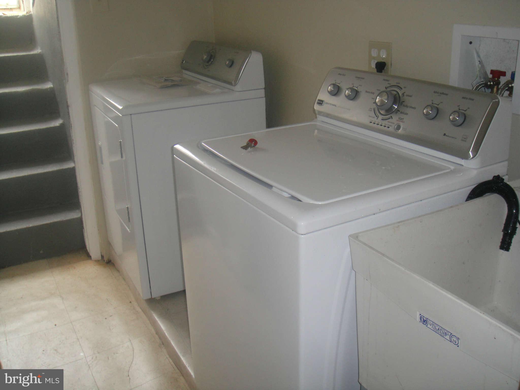 625 Columbia Road Northwest Washington, DC 20001 - Photo 26 of 26 a utility room with dryer and washer