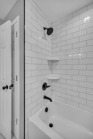 a bathroom with a bathtub