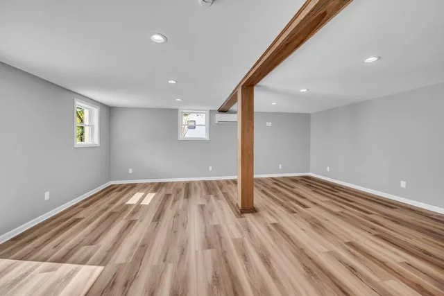 a view of a livingroom with wooden floor