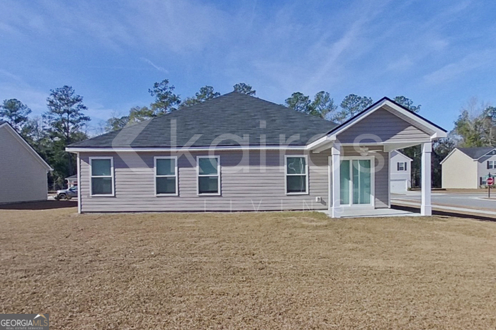 109 Bluff Road Springfield, GA 31329 - Photo 19 of 21 a front view of a house with a yard