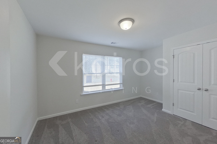 109 Bluff Road Springfield, GA 31329 - Photo 10 of 21 an empty room with windows