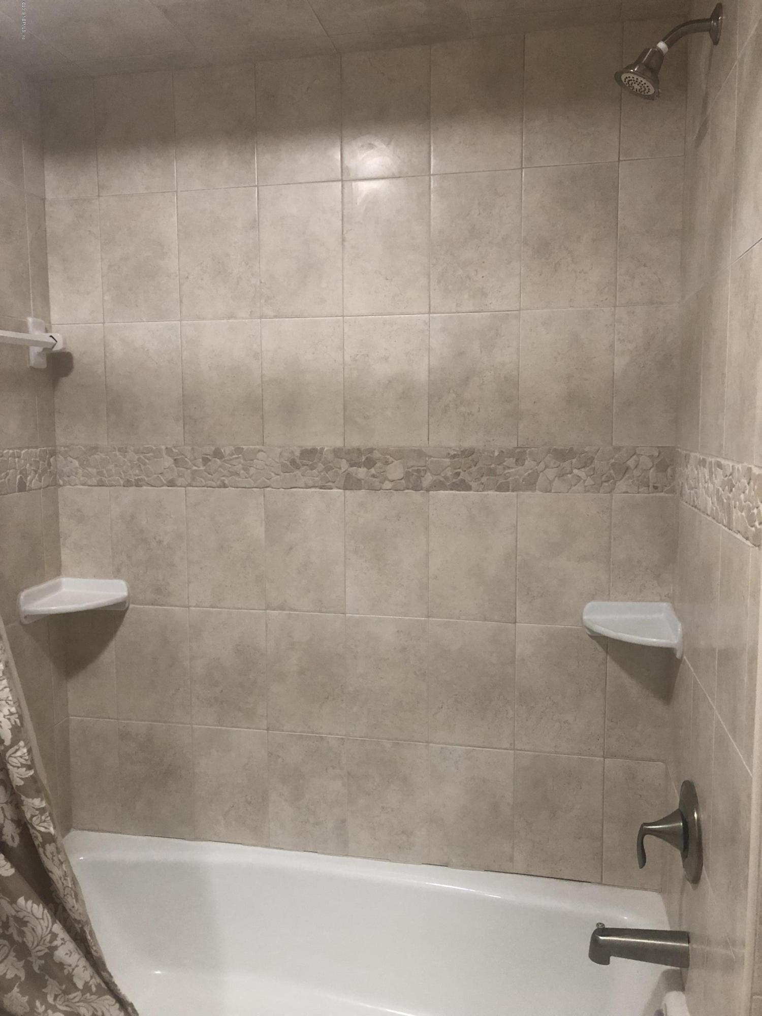 2422 Provost Road East Jacksonville, FL 32216 - Photo 11 of 18 a bathroom with a shower