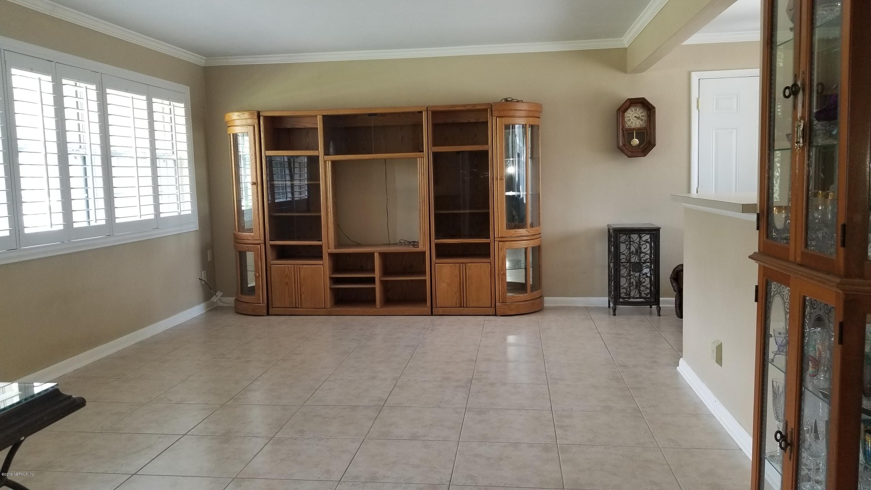 2422 Provost Road East Jacksonville, FL 32216 - Photo 18 of 18 an empty room with closet and windows