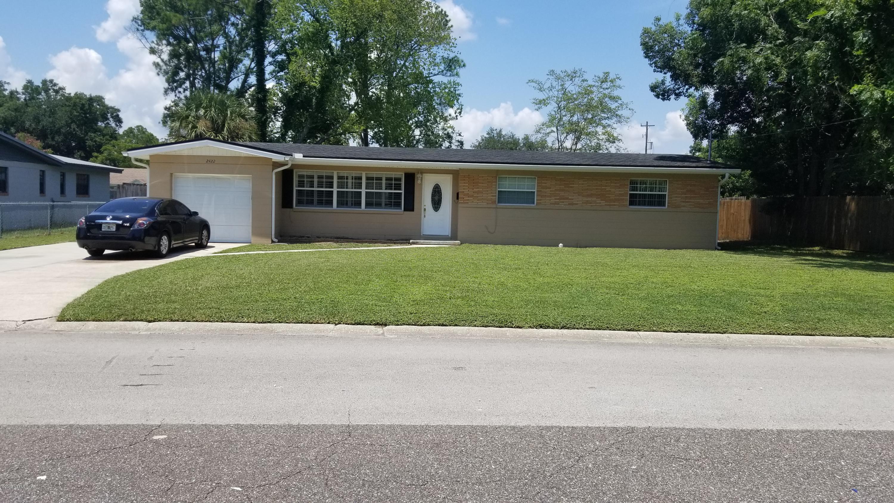 2422 Provost Road East Jacksonville, FL 32216 - Photo 2 of 18 a view of a yard in front view of a house