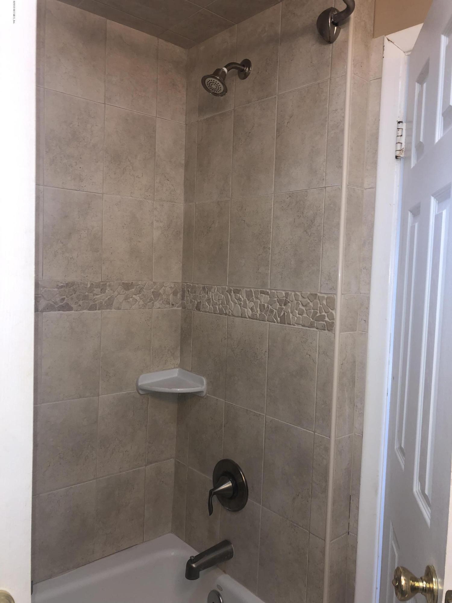 2422 Provost Road East Jacksonville, FL 32216 - Photo 8 of 18 a bathroom with a shower