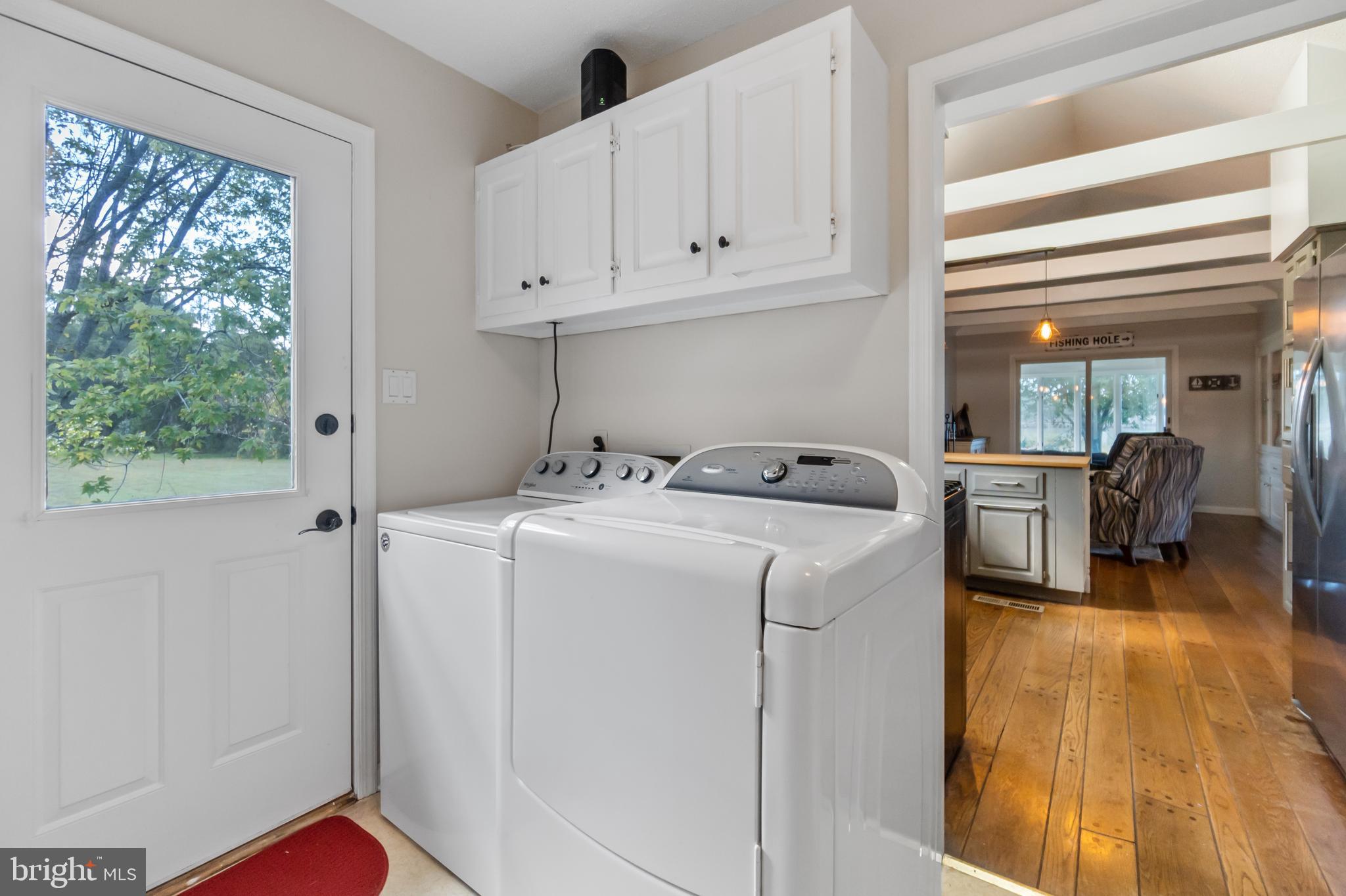 1418 Town Point Road Cambridge, MD 21613 - Photo 19 of 48 Laundry room, with door to side yard