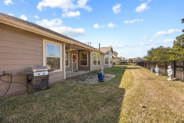 a view of a brick house with a large window