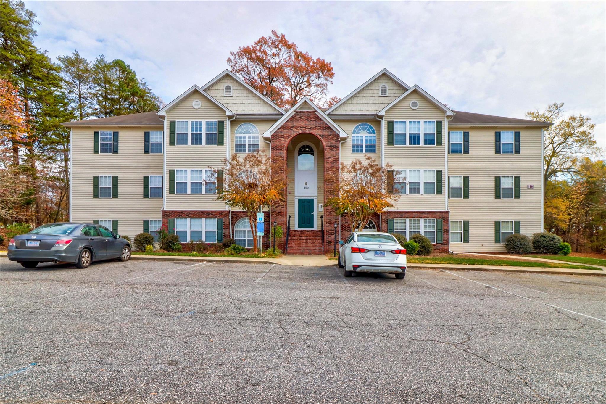 160 James Road, Unit 1D High Point, NC 27265 - Photo 1 of 33 a car parked in front of a houses