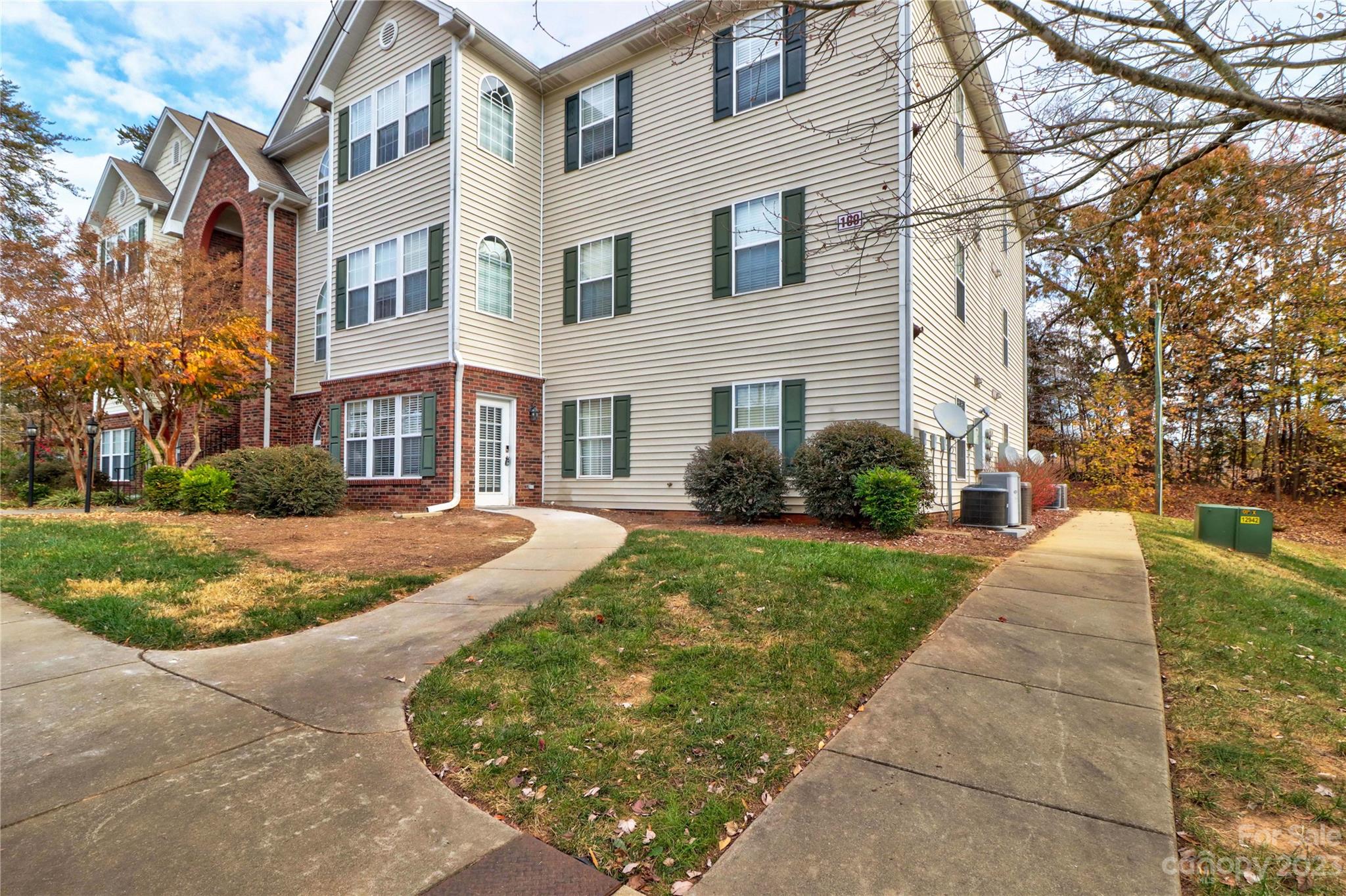 160 James Road, Unit 1D High Point, NC 27265 - Photo 2 of 33 a front view of a house with yard and green space