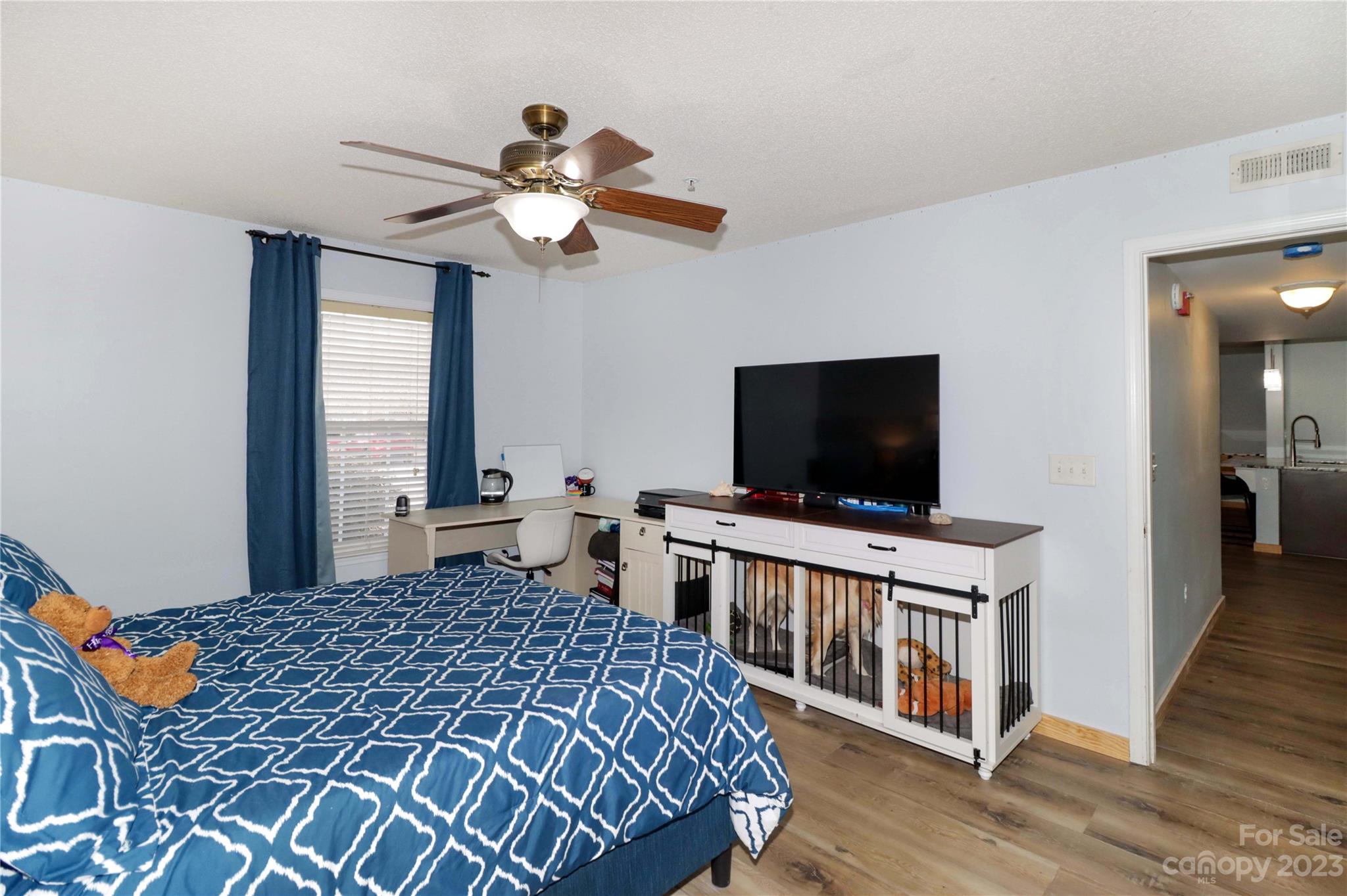 160 James Road, Unit 1D High Point, NC 27265 - Photo 21 of 33 a bedroom with a bed and a flat screen tv