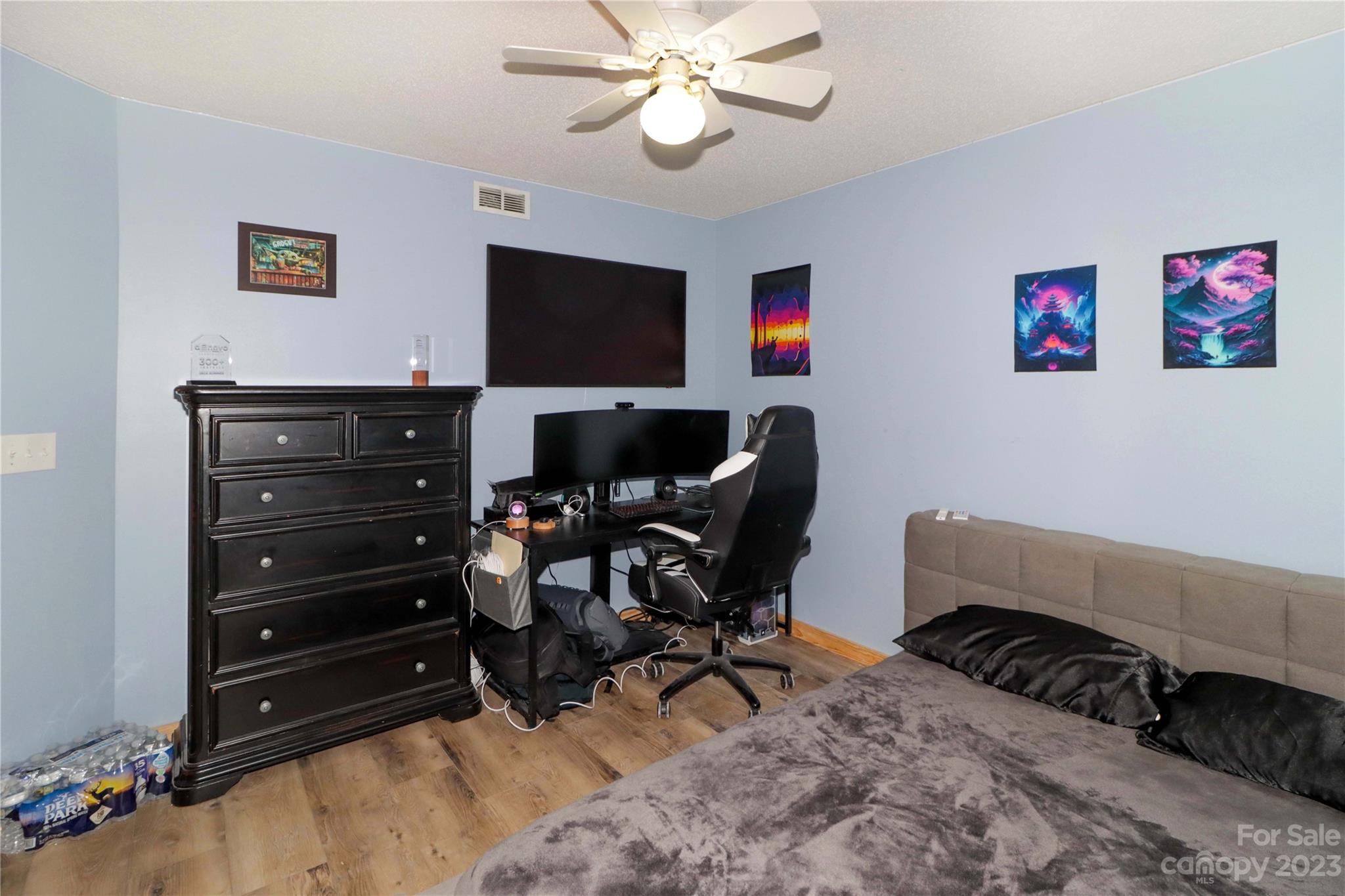 160 James Road, Unit 1D High Point, NC 27265 - Photo 26 of 33 a bedroom with a bed and a flat screen tv