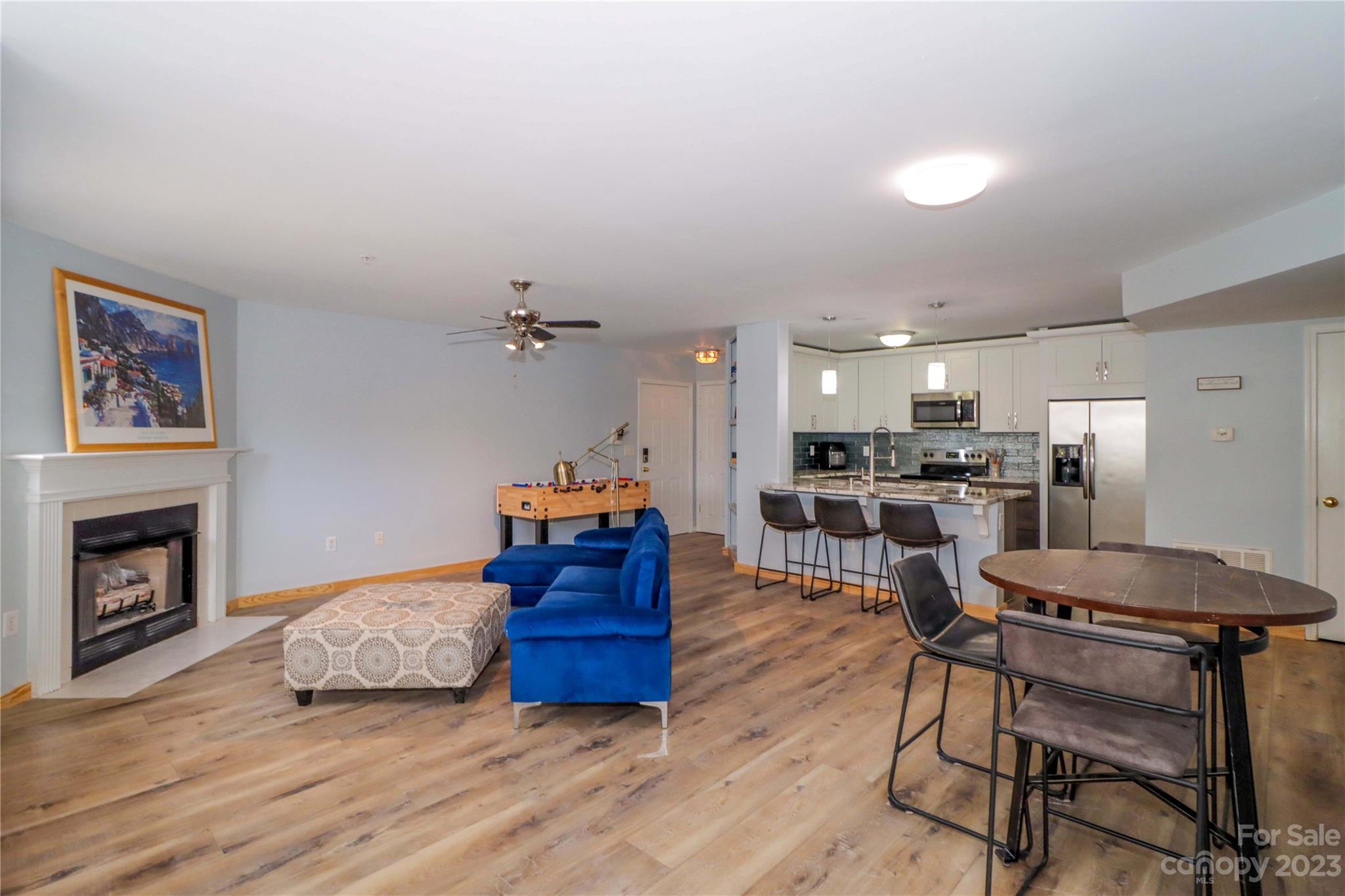 160 James Road, Unit 1D High Point, NC 27265 - Photo 7 of 33 a bed room with furniture and a fireplace