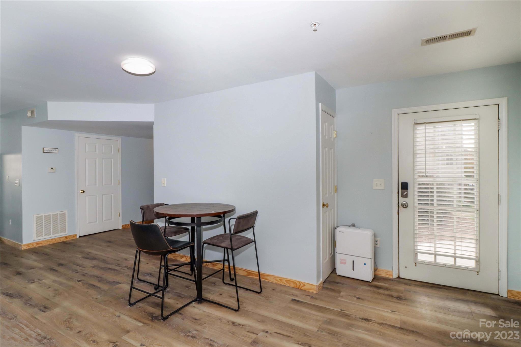 160 James Road, Unit 1D High Point, NC 27265 - Photo 10 of 33 a view of a workspace with furniture and a window