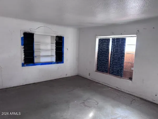 an empty room with windows