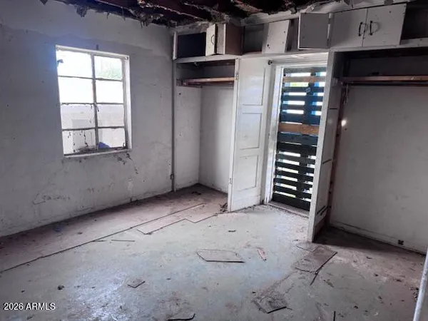 an empty room with windows