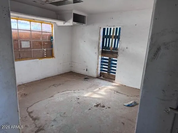 an empty room with windows