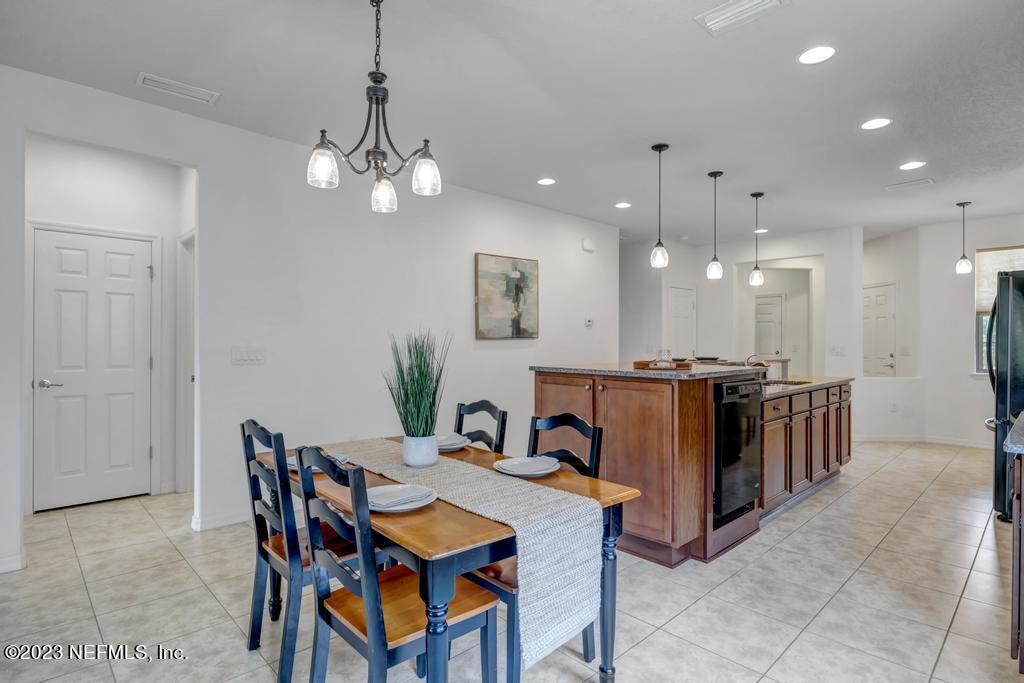 265 Caspia Lane Ponte Vedra, FL 32081 - Photo 15 of 86 a view of a dining room with furniture