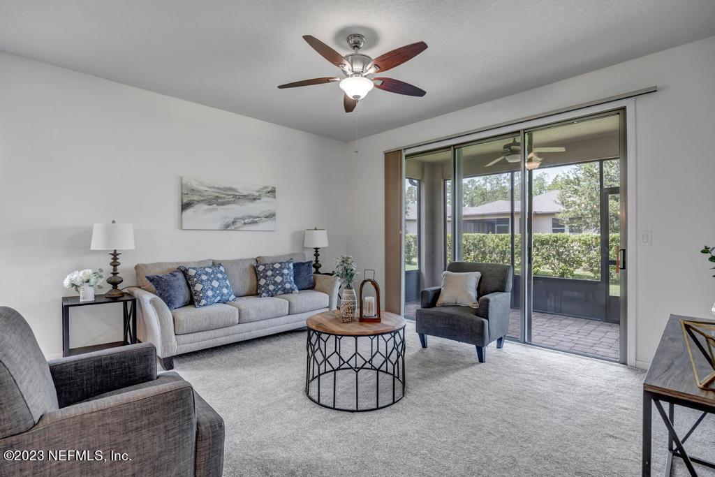 265 Caspia Lane Ponte Vedra, FL 32081 - Photo 19 of 86 a living room with furniture and a large window
