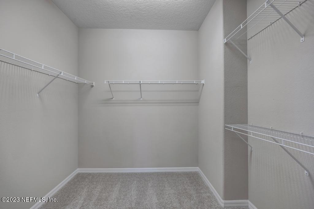 265 Caspia Lane Ponte Vedra, FL 32081 - Photo 28 of 86 a view of an empty walk in closet