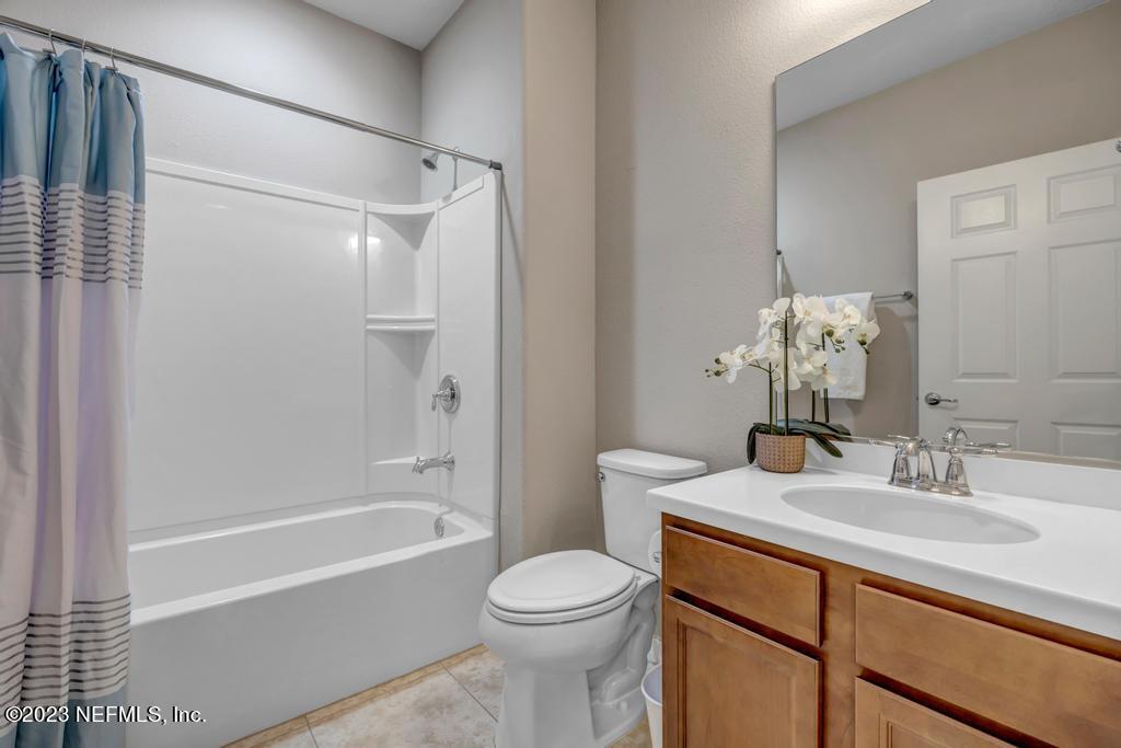 265 Caspia Lane Ponte Vedra, FL 32081 - Photo 31 of 86 a bathroom with a sink toilet and shower