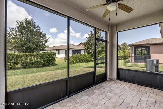 a room with pool table and flat screen tv