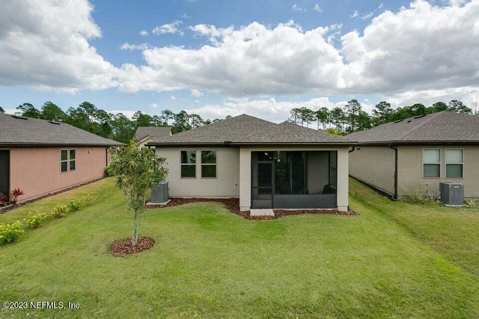 265 Caspia Lane Ponte Vedra, FL 32081 - Photo 37 of 86 a view of a house with a yard and sitting area