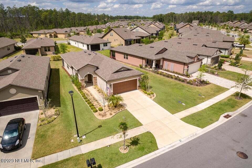 265 Caspia Lane Ponte Vedra, FL 32081 - Photo 40 of 86 an aerial view of residential houses with outdoor space