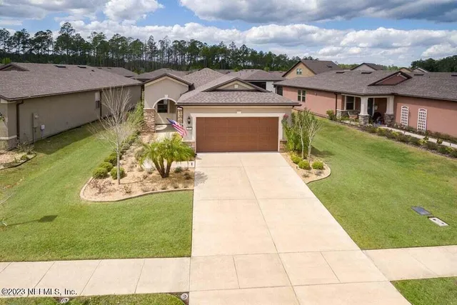 a view of a park with swings and a table
