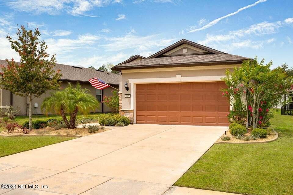 265 Caspia Lane Ponte Vedra, FL 32081 - Photo 5 of 86 a front view of a house with a yard